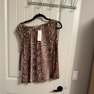 Snake print blouse size EX never been worn by Calvin Klein, made in Indonesia.
